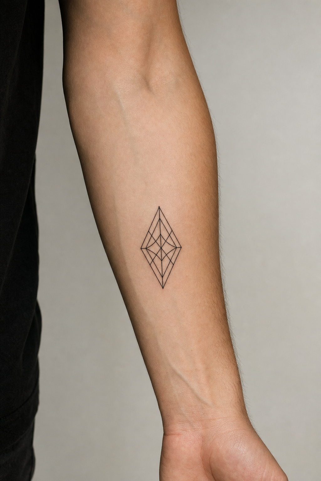 StarInk AI tattoo preview — Minimalist geometric design on male arm, inner forearm, black ink